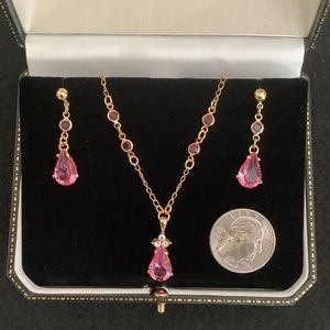 Vintage Avon in box rose rhinestone necklace & earrings sets.